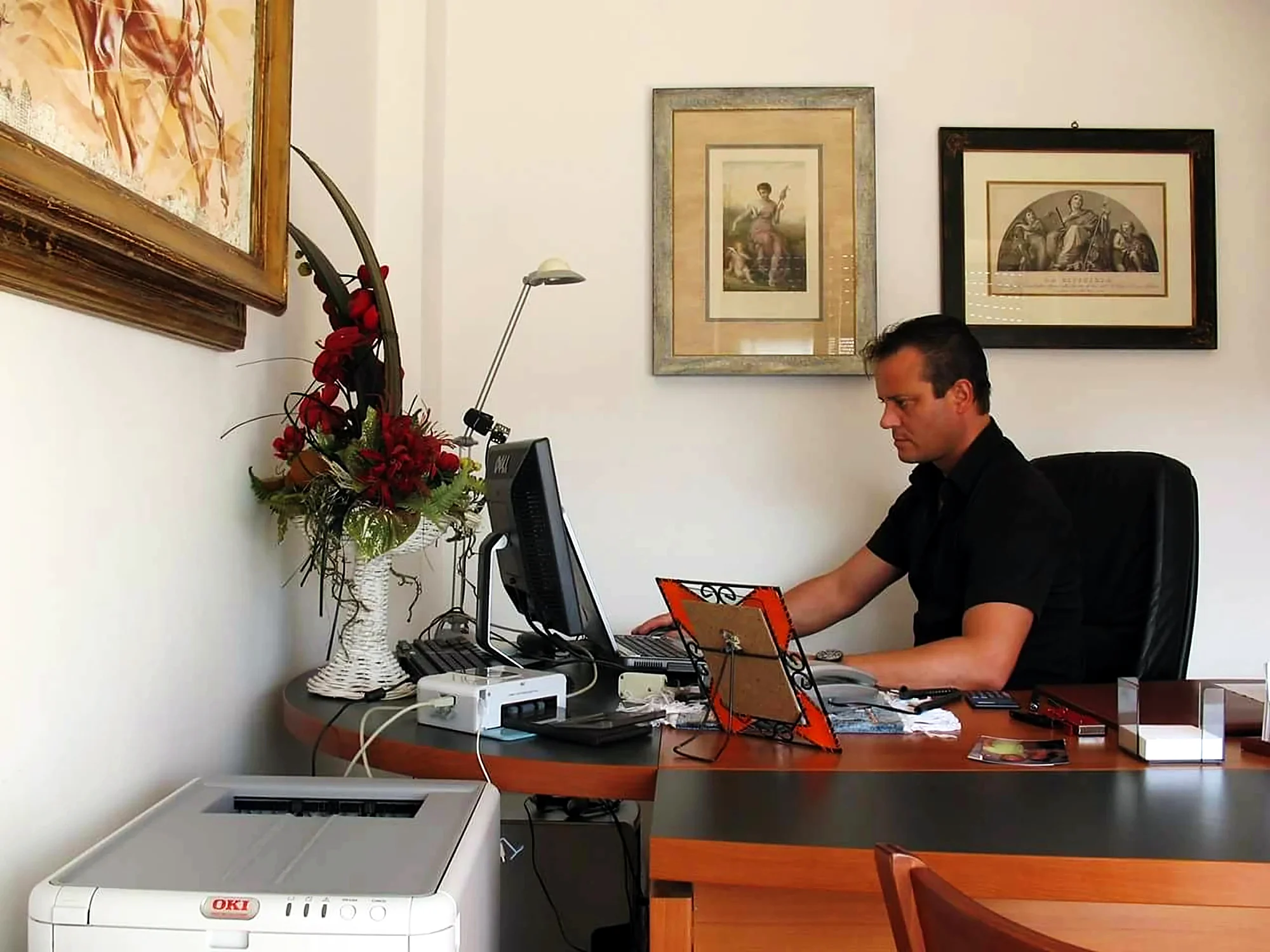 Alessandro Cascio, founder of Demetra Group, at his desk