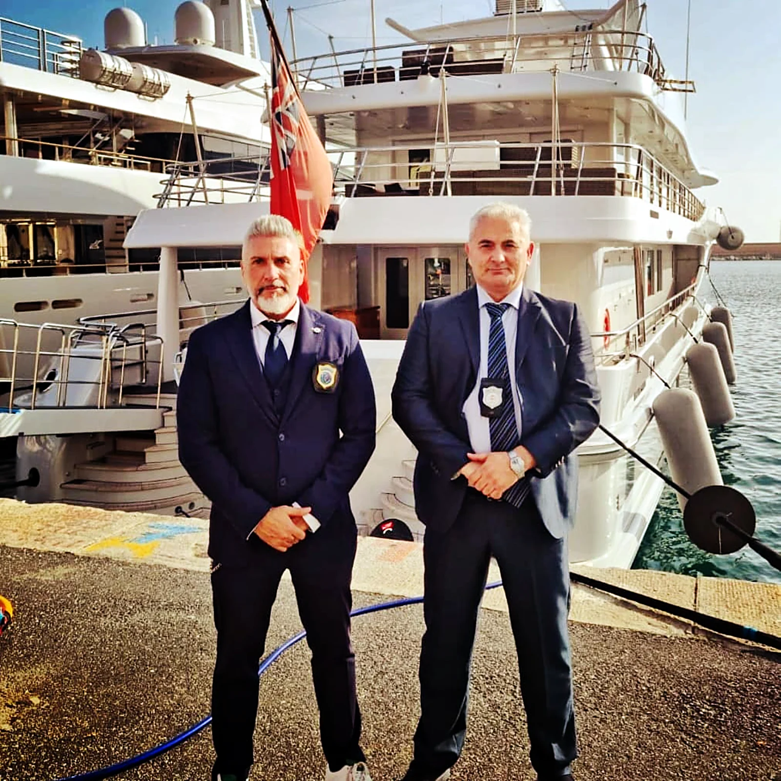 Two Demetra Group officers on duty at a yachting event